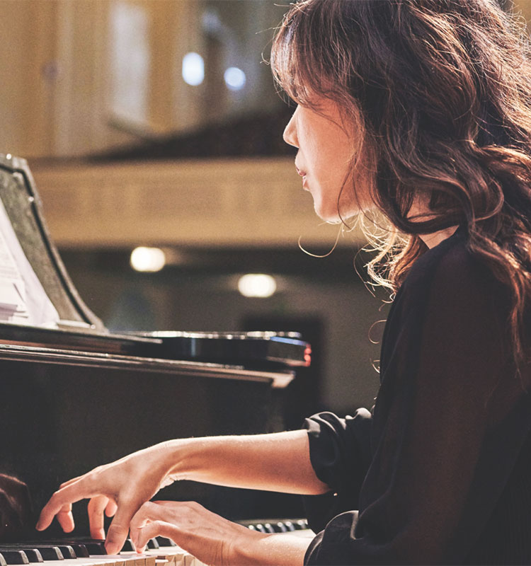 Student playing piano